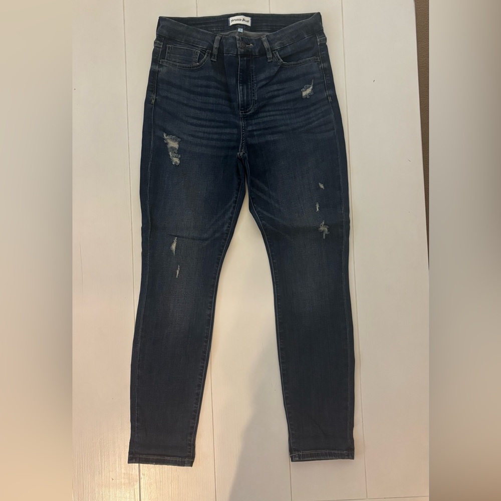 Brand New W/O Tags Studio Blue Jeans with Distressed Detailing.